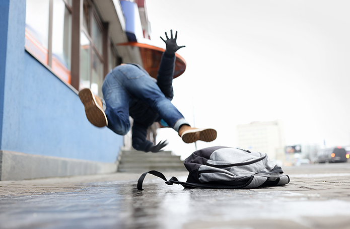 person slipping on an icy walkway